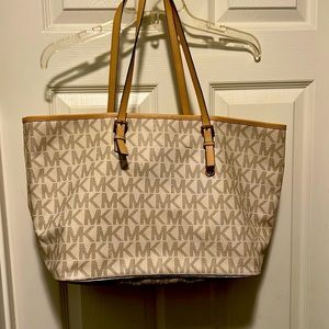 Womens original Michael Kors hang bag